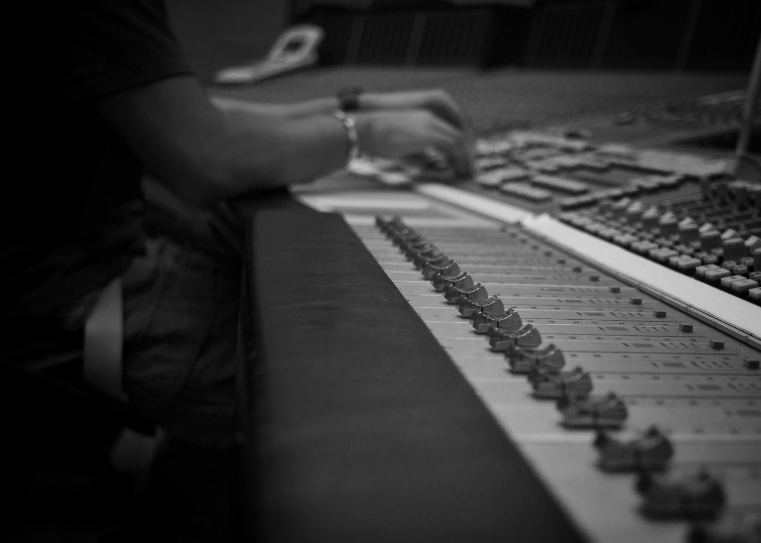Kori Anders working at a mixing console